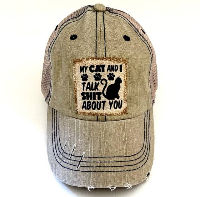 MY CAT AND I TALK SHIT ABOUT YOU DISTRESSED TRUCKER HAT: BLING / BLACK
