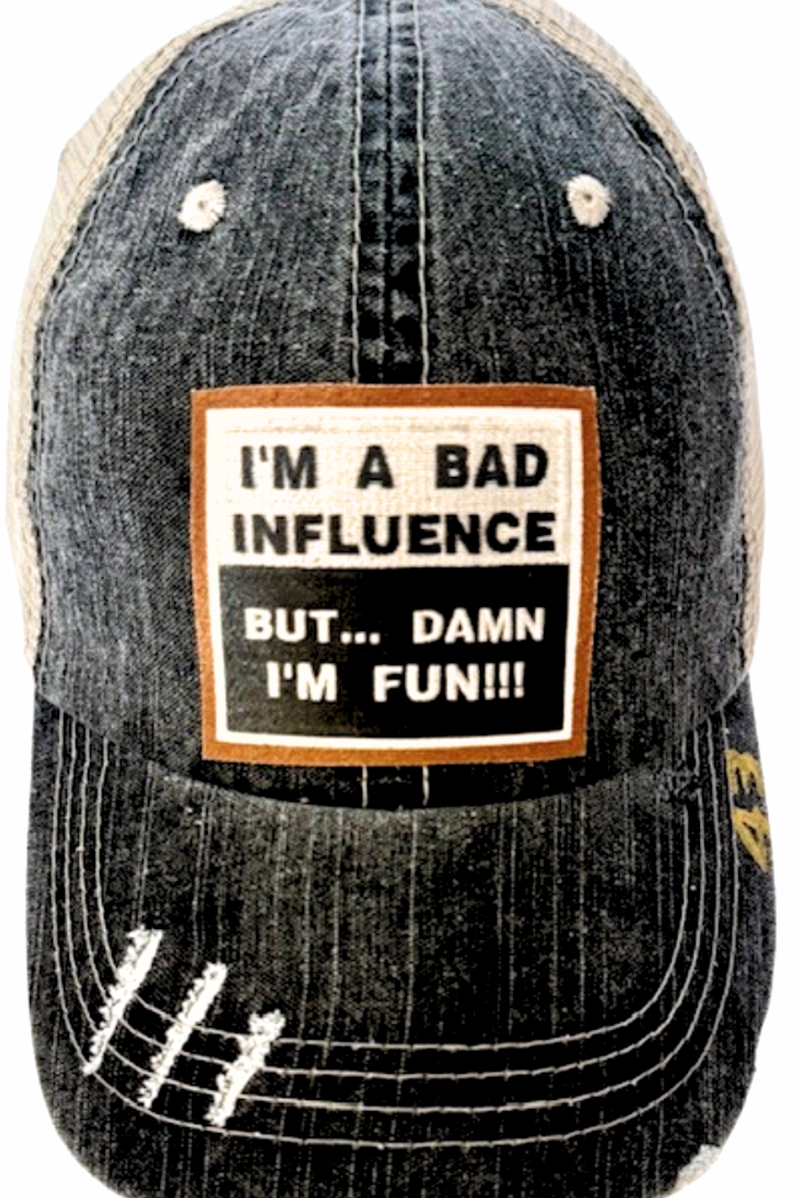 (43) "I'M A BAD INFLUENCE" DISTRESSED TRUCKER HAT: BLING / PINK