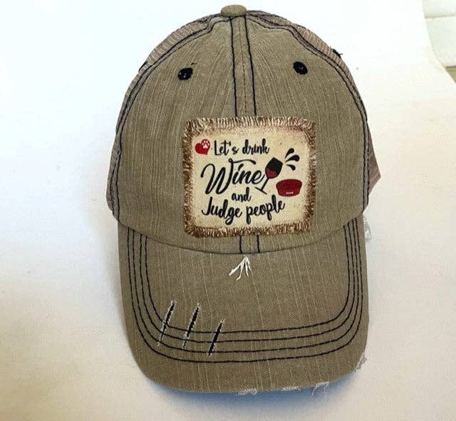 "LET'S DRINK WINE AND JUDGE PEOPLE" DISTRESSED TRUCKER HAT (#477): BLING / BLACK